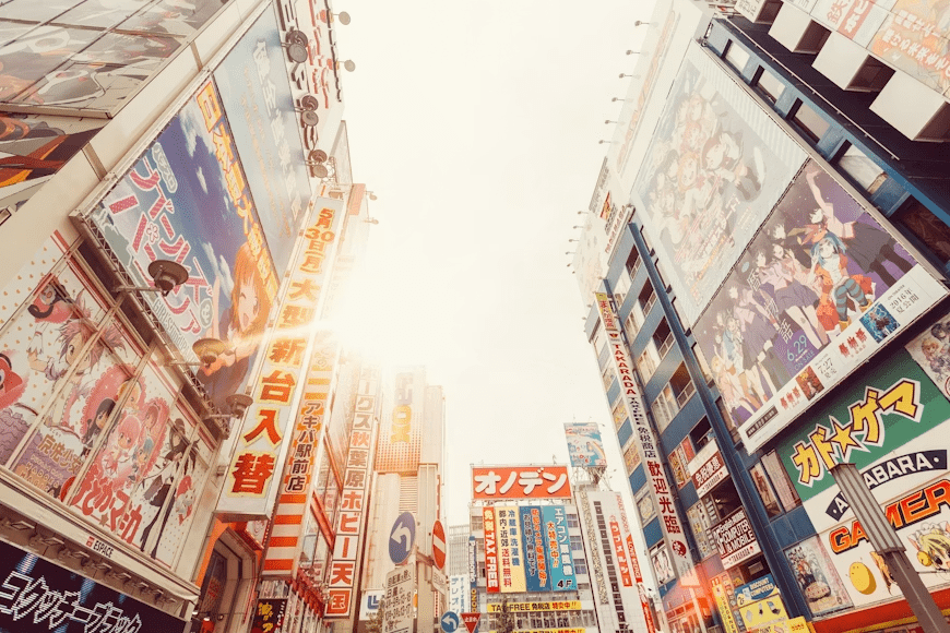 Anime pop-up store displaying character merchandise, themed decorations, and promotional artwork.